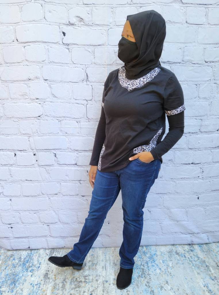 Women's T-shirt black medium with black and white cotton side panels and sleeve trim