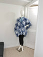 White and blue plaid fleece wrap