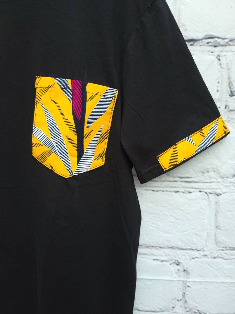 Men's ankara T-shirt black medium size with burnt yellow African print kitenge pocket and sleeve trim