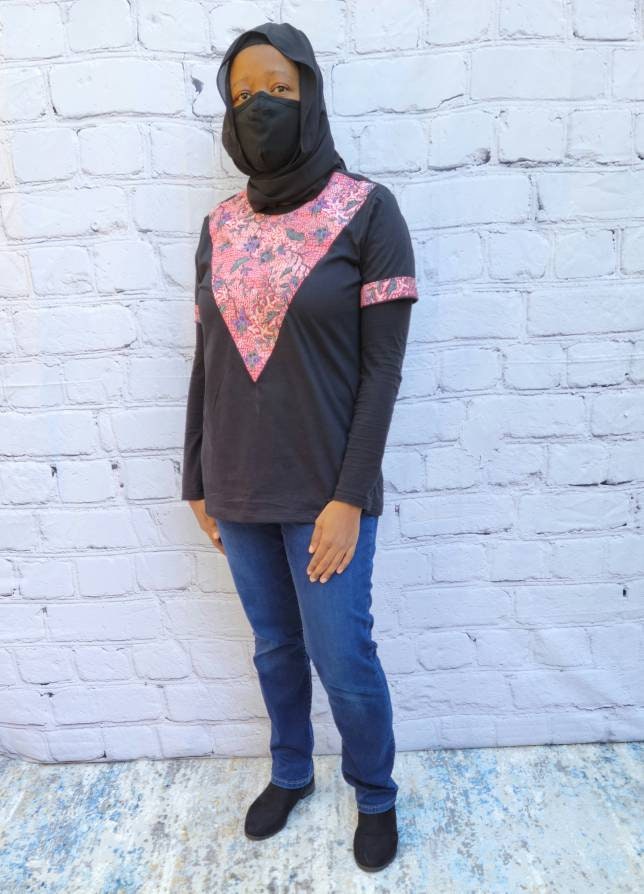 Women's T-shirt black medium with red purple African print kitenge neck embellishment and sleeve trim