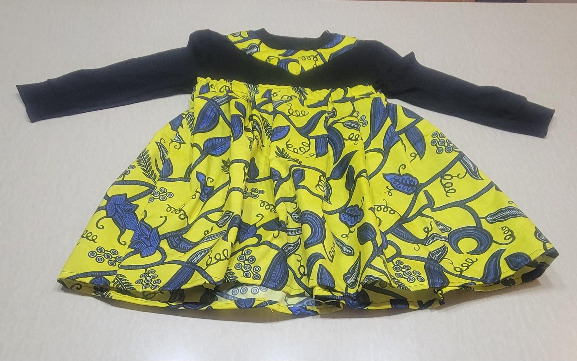 Girls' black long-sleeve tshirt with blue&yellow skirt attachment 5T -6T