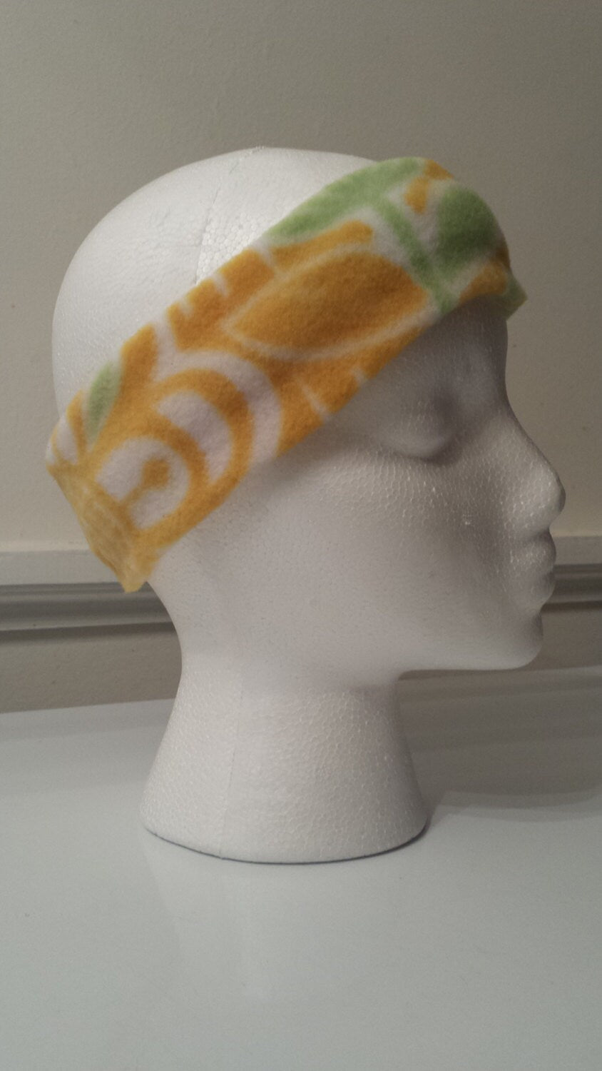 Fleece ear warmer in yellow floral print (children's size M)