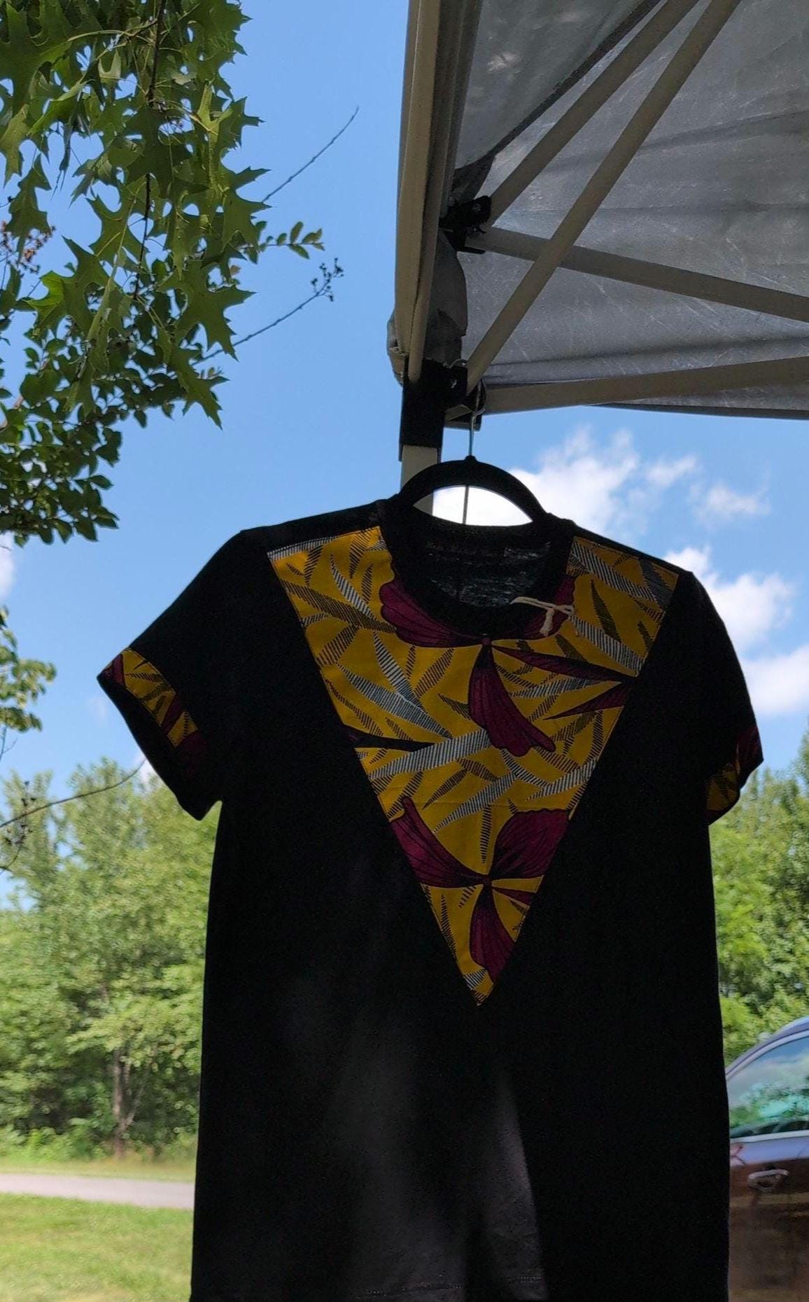 Women's ankara T-shirt medium black with burn yellow African print kitenge neck embellishment and sleeve trim (US 6-8; S-M)